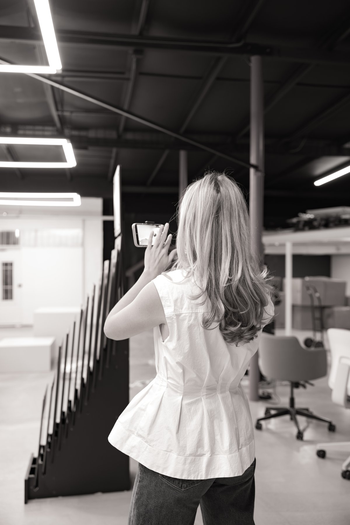 Liv filming with a phone gimbal on set